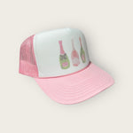 Popping Bottles Trucker Hat in Pink/White